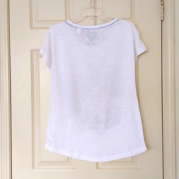 NWOT. H&M 100% Organic Cotton Short Sleeve Loose Fit Tee w/front color patterns. - Picture 2 of 4